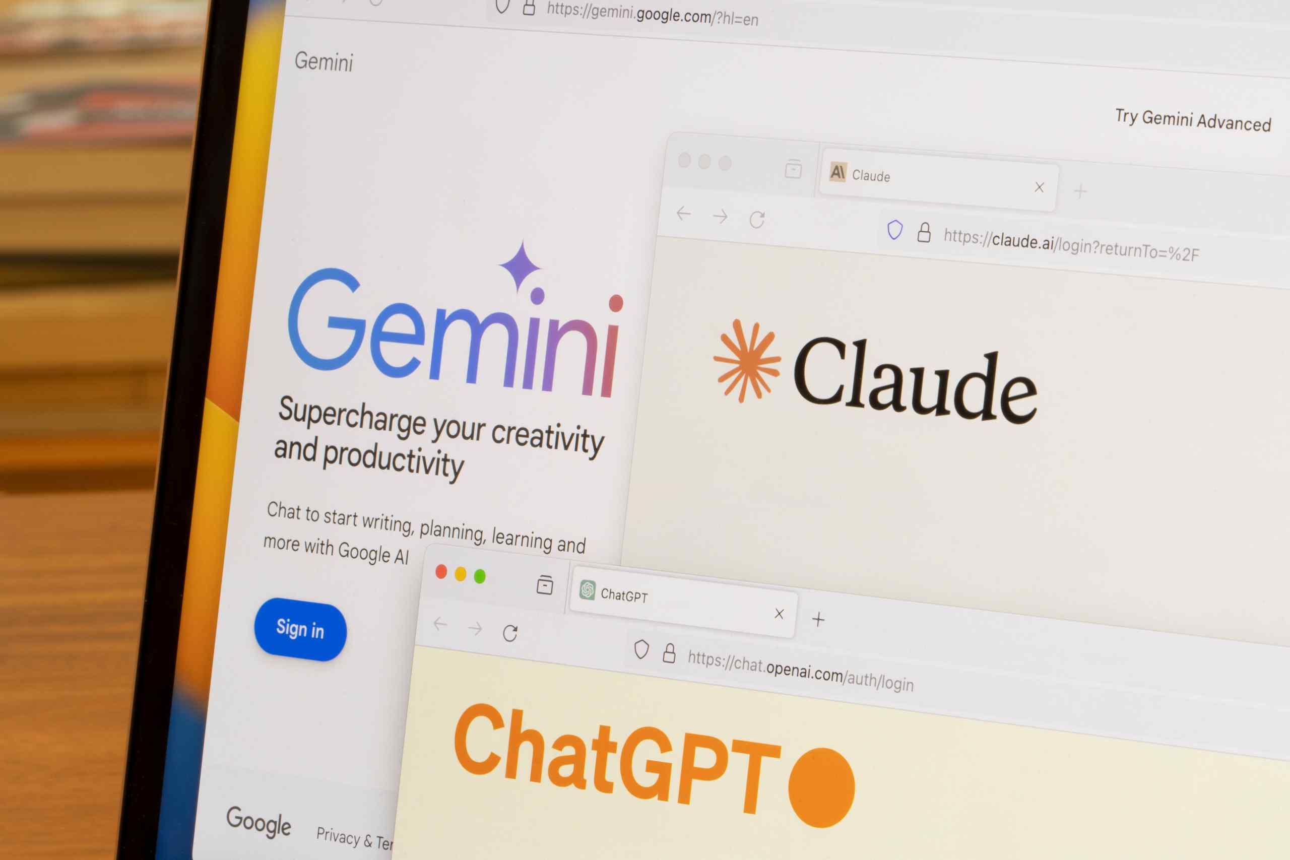 A photo of a computer screen showcasing LLMs Gemini, Claude and ChatGPT.